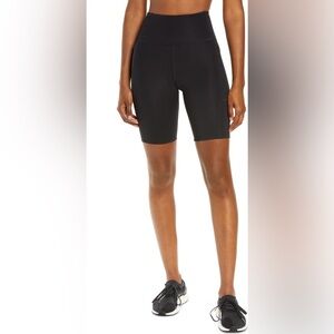 Girlfriend Collective High Rise Pocket Bike Shorts in Haze Blue
